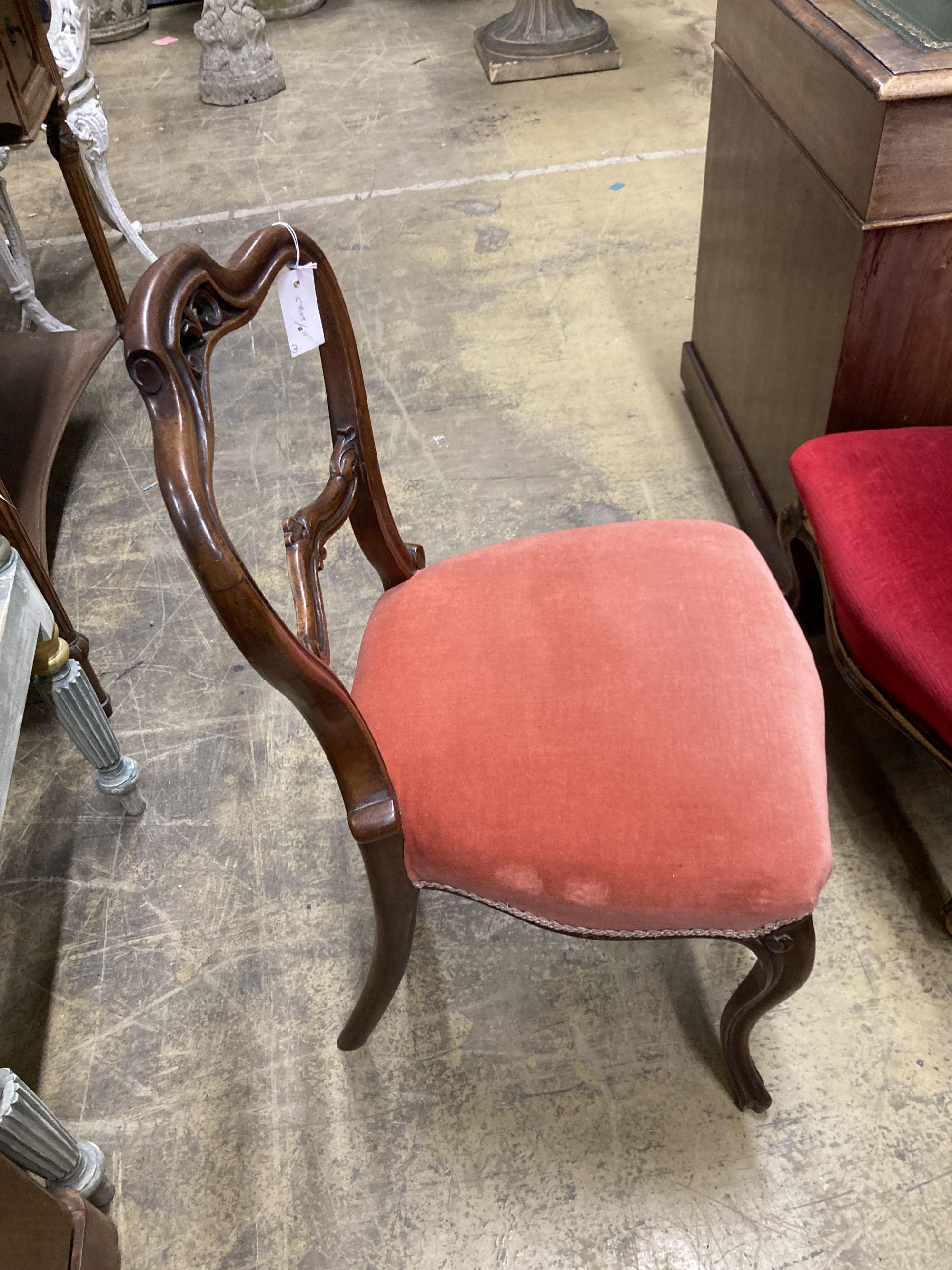 A Victorian oval tripod table, width 68cm, depth 52cm, height 72cm together with four Victorian spoon back dining chairs (three plus one)